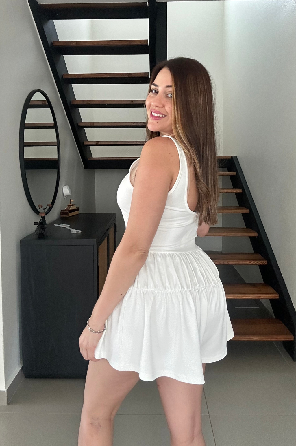 Sleeveless scuba romper in stretchy scuba fabric, sleek and modern design, versatile summer outfit