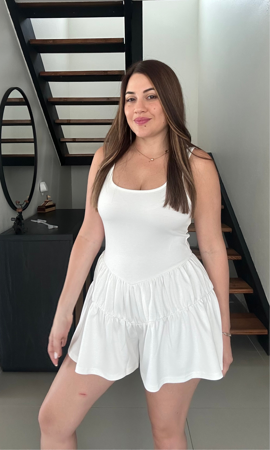 Sleeveless scuba romper in stretchy scuba fabric, sleek and modern design, versatile summer outfit