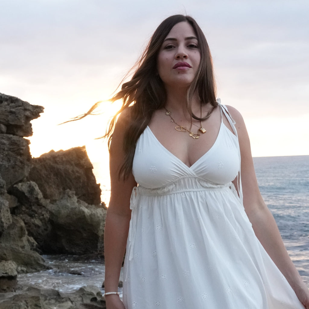 Eyelet lace maxi dress, lightweight flowy fabric, inspired elegance, perfect sunset outfit.