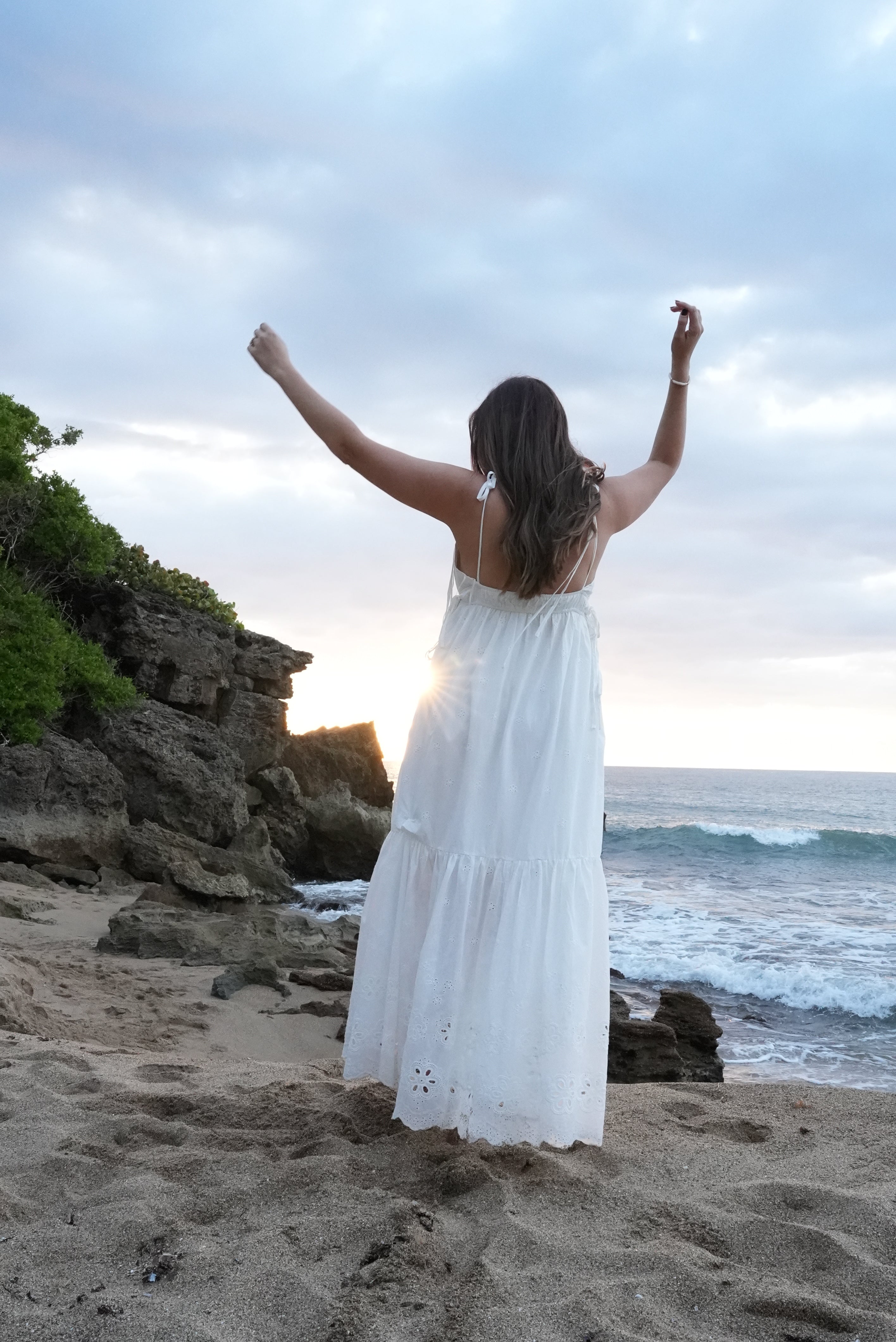 Eyelet lace maxi dress, lightweight flowy fabric, inspired elegance, perfect sunset outfit.