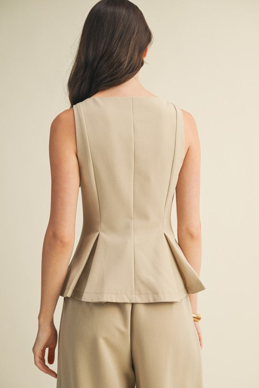 Women’s boat neck sleeveless top, elegant and versatile summer blouse, chic wardrobe essential.