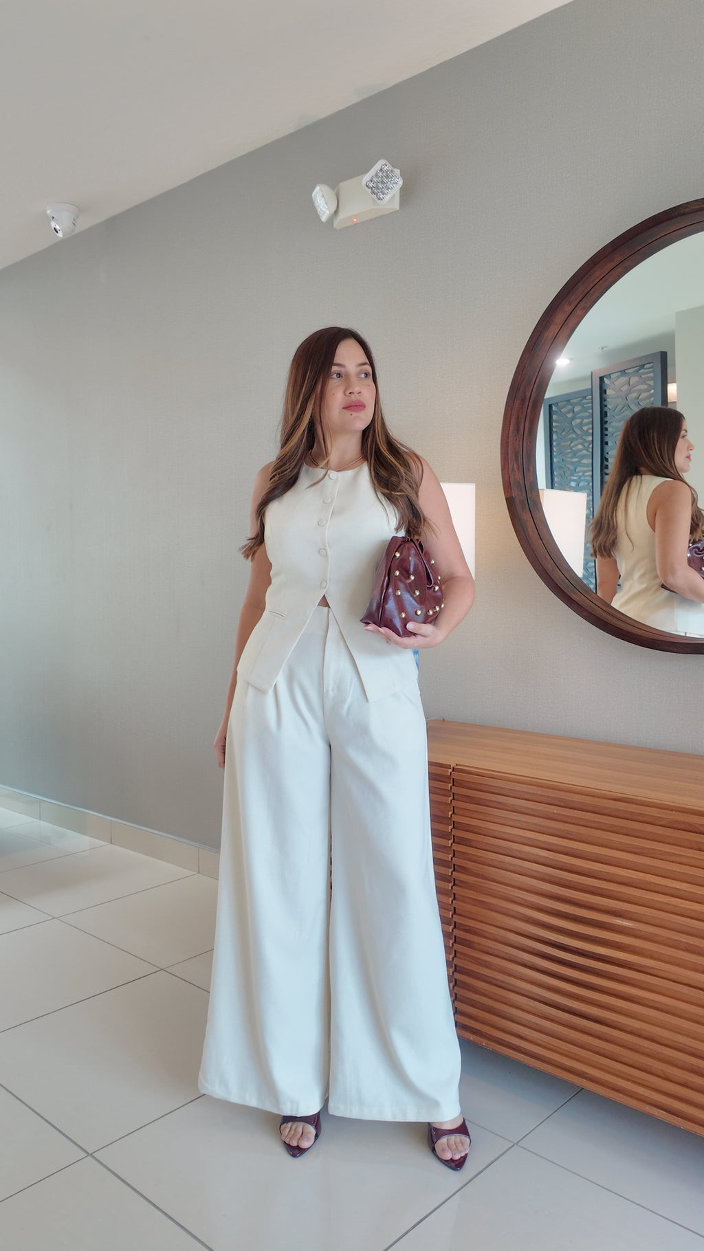 Tailored vest top with button closure and wide-leg palazzo pants, women’s chic 2-piece suit set