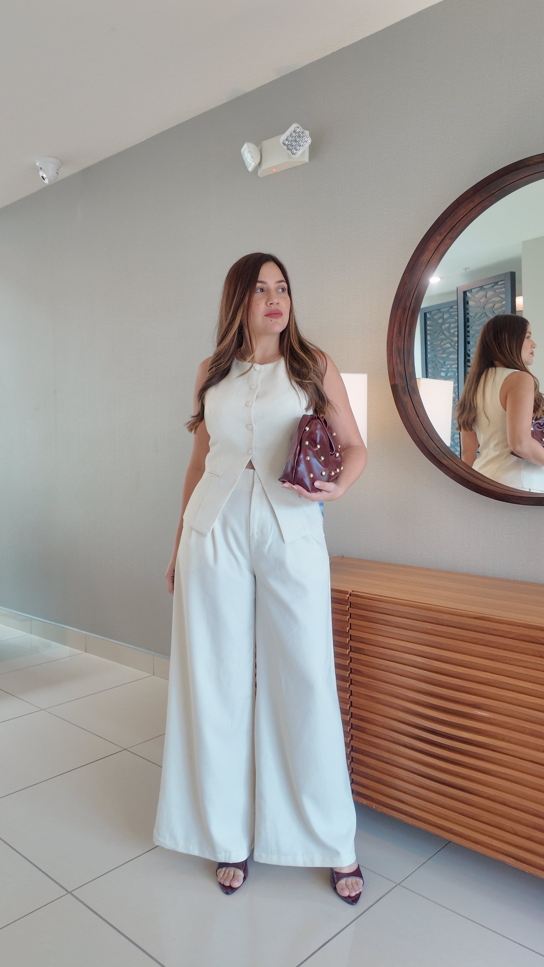 Tailored vest top with button closure and wide-leg palazzo pants, women’s chic 2-piece suit set