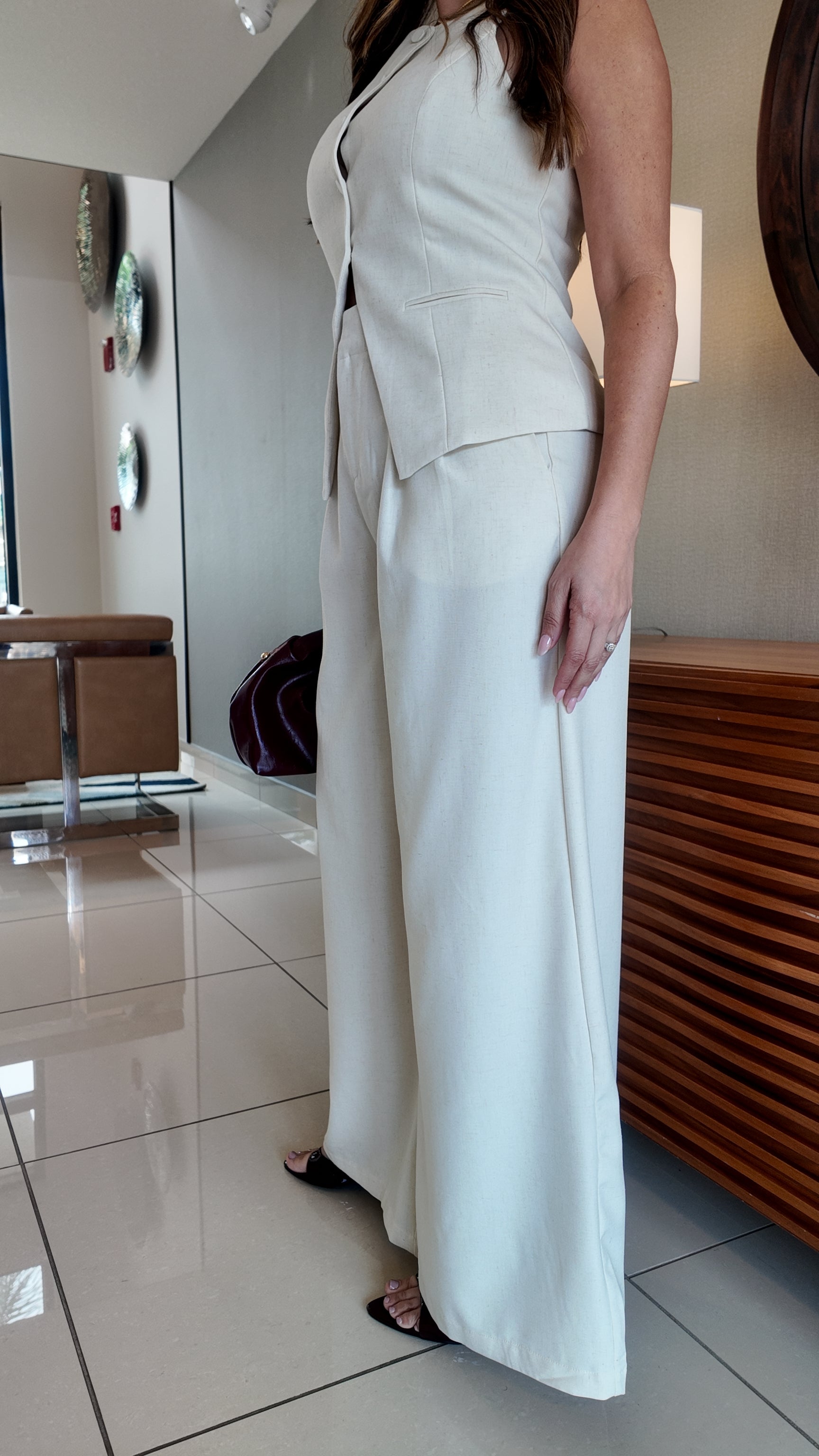 Tailored vest top with button closure and wide-leg palazzo pants, women’s chic 2-piece suit set