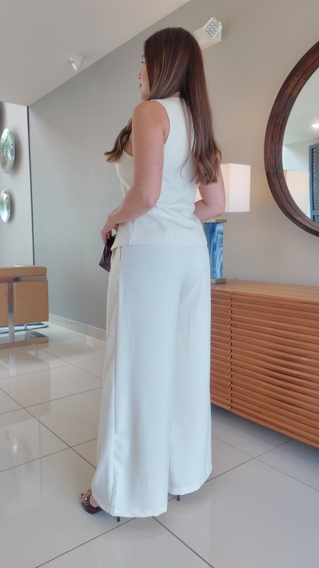 Tailored vest top with button closure and wide-leg palazzo pants, women’s chic 2-piece suit set